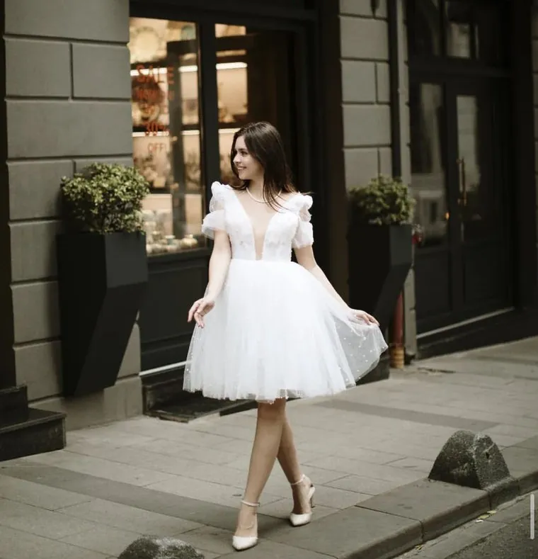 Bride in a short tulle dress